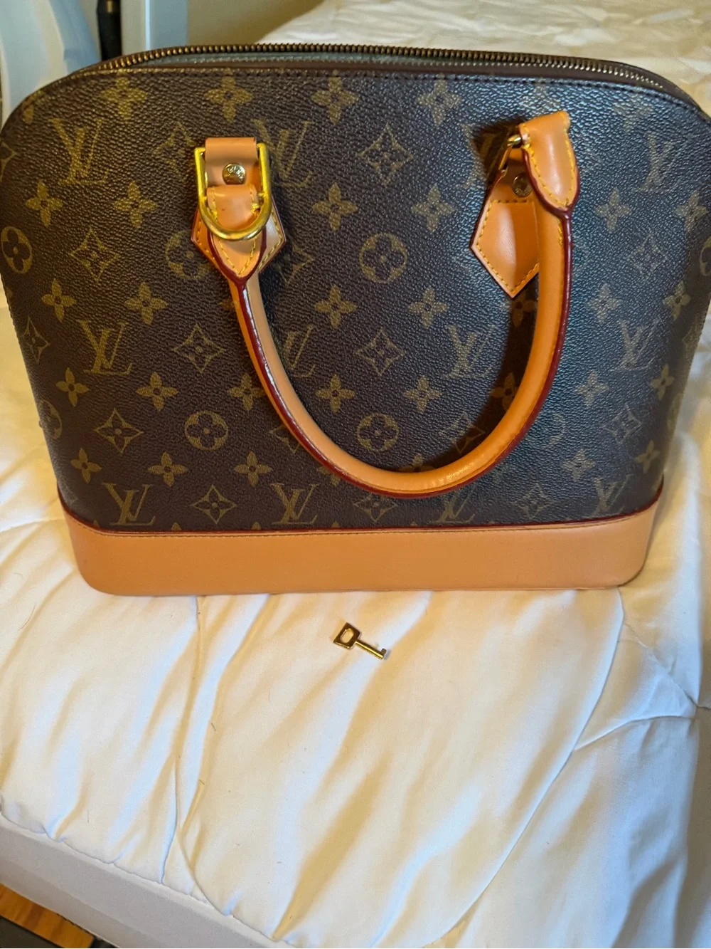 Louis Vuitton Monogram Canvas Brown and Tan Alma PM Shoulder Bag